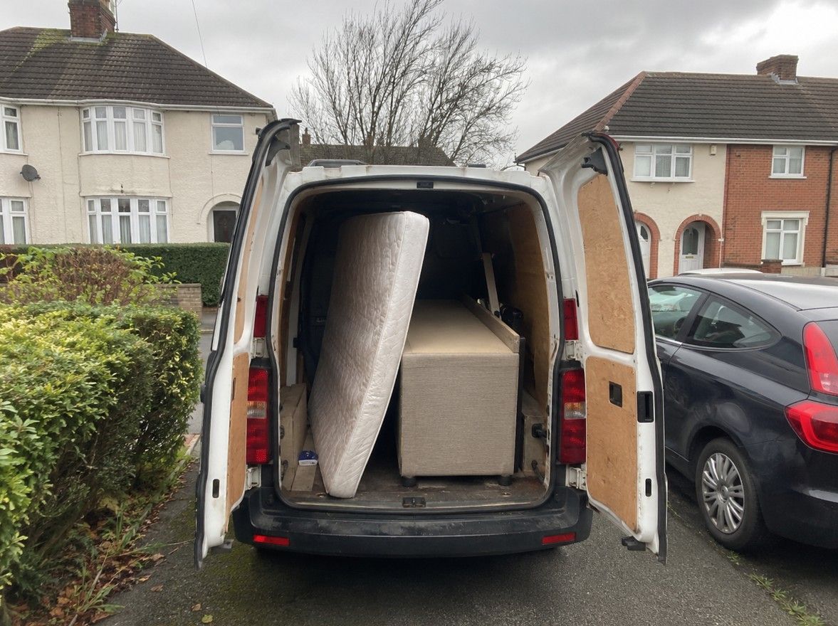 Van loaded with a mattress and bed base collected in Cardiff by J&Z House Clearance