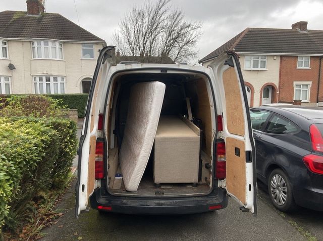 Van loaded with a mattress and bed base collected in Cardiff by J&Z House Clearance