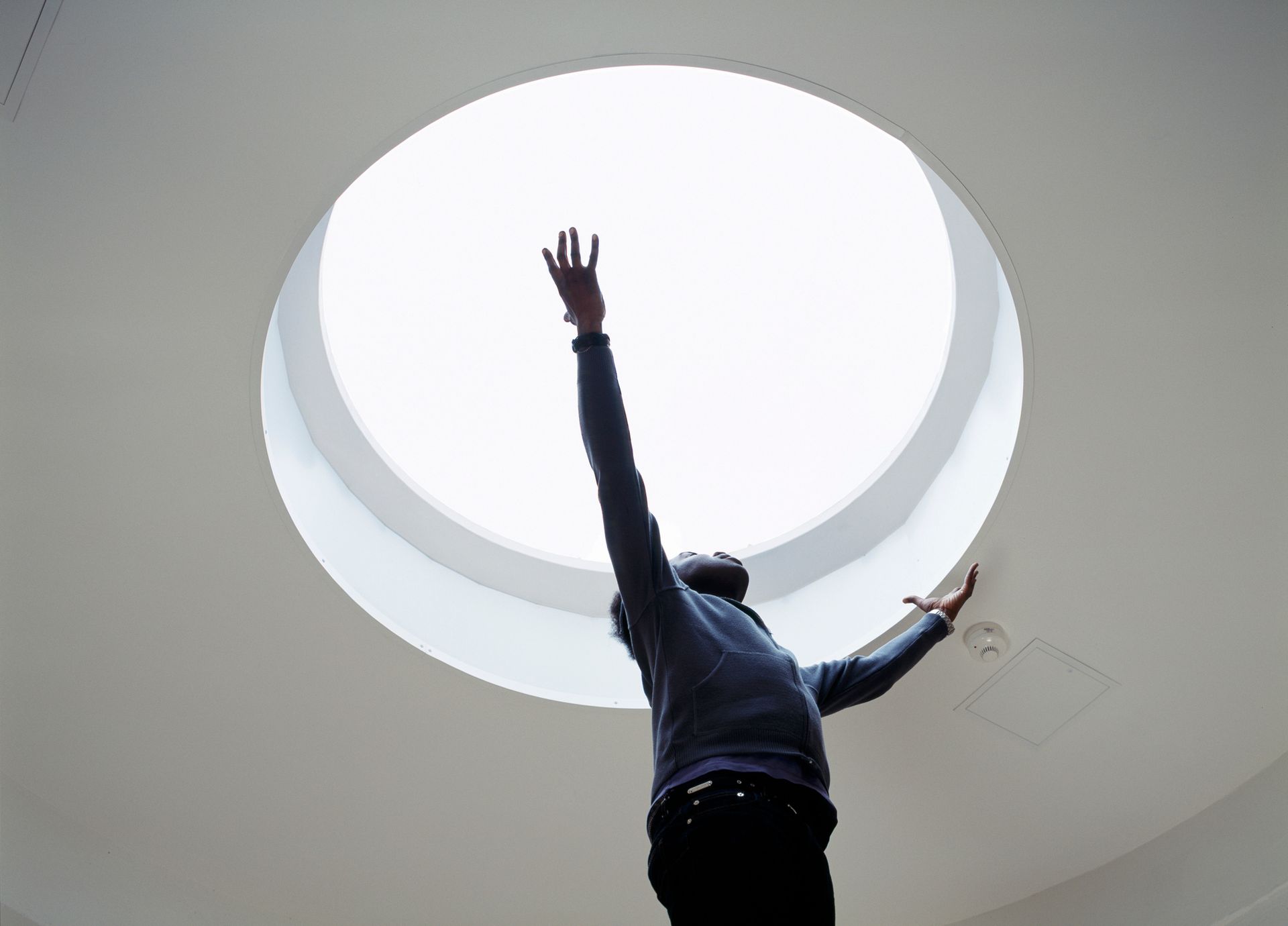 Specialist installing a skylight in the ceiling. Specialist installing a skylight in the ceiling.