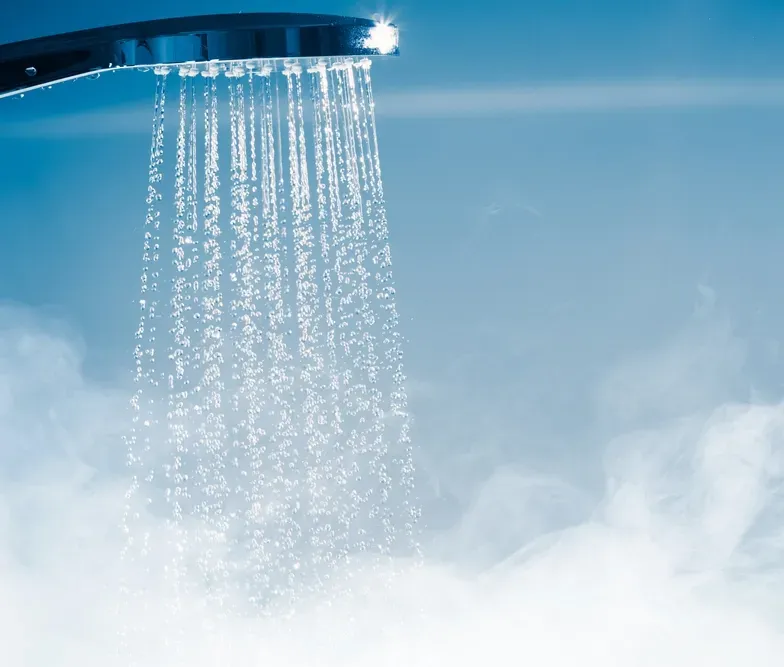 Hot Water From a Shower with Steam— Illawater Hot Water Services in East Corrimal, NSW