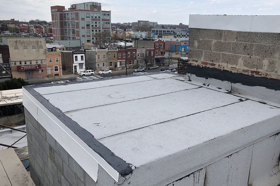 The roof of a building with a view of the city