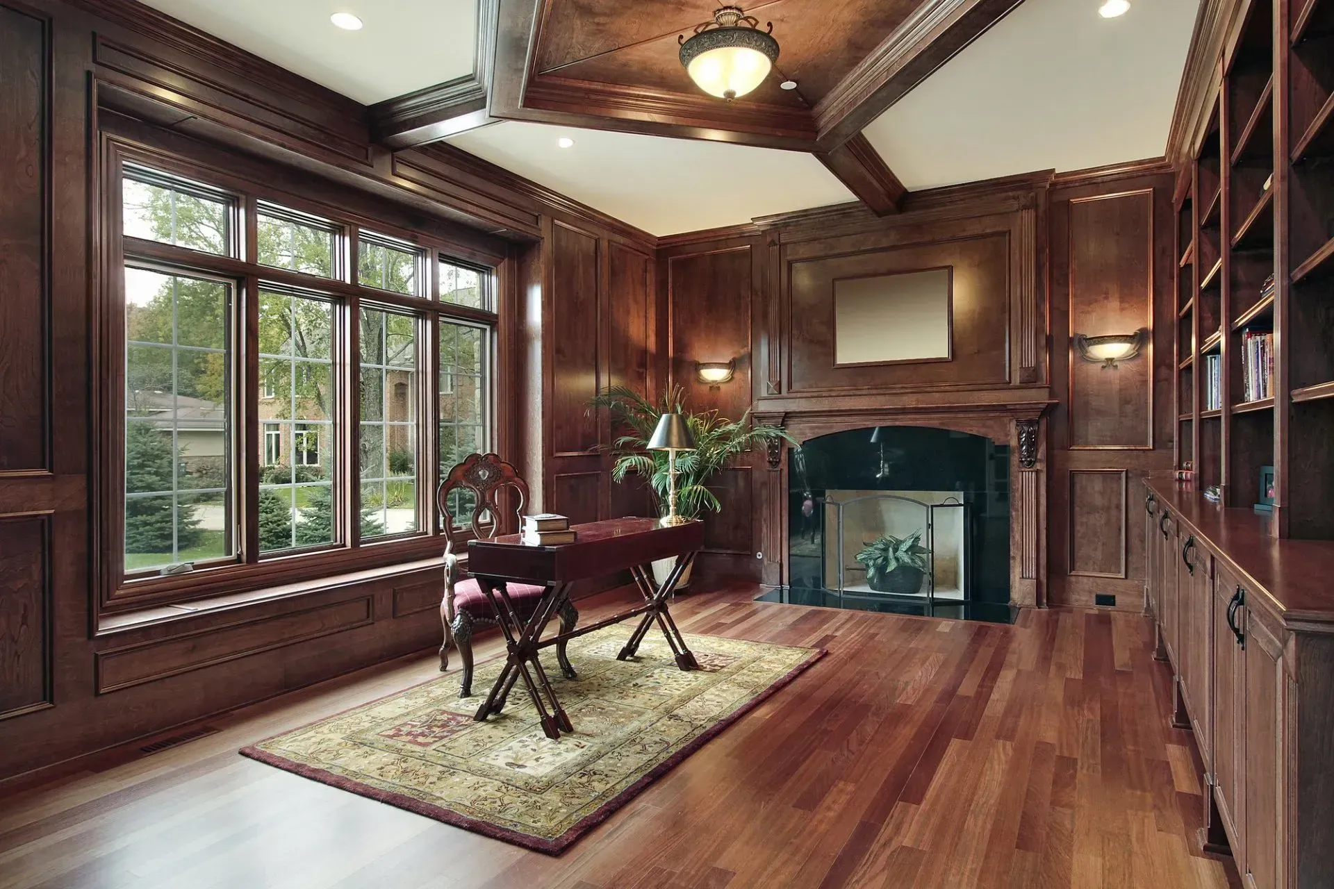 There is a fireplace in the middle of the room