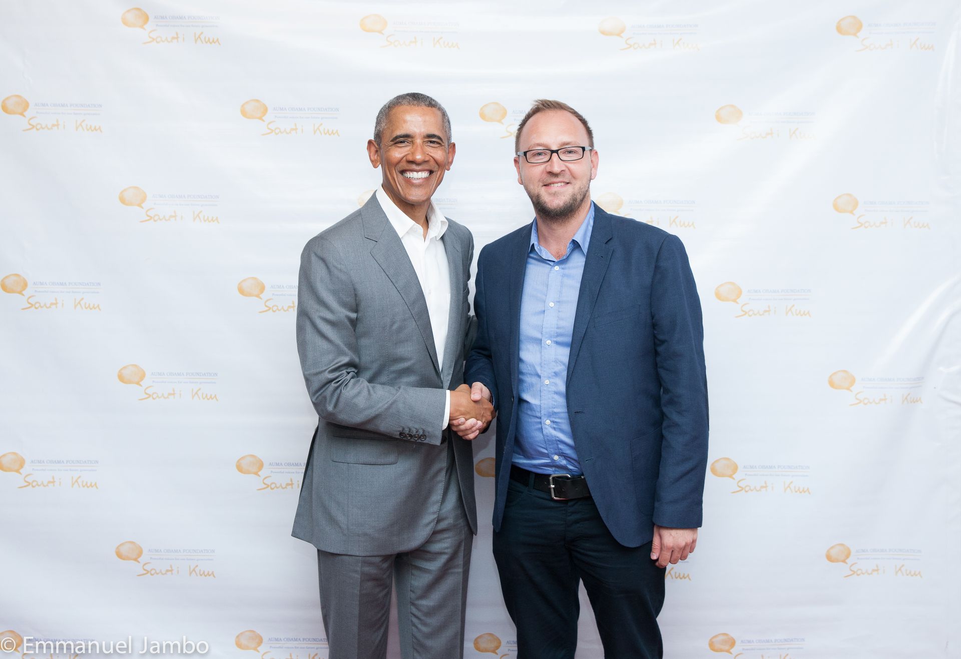 Das Bild zeigt Barack Obama und André Puchta.