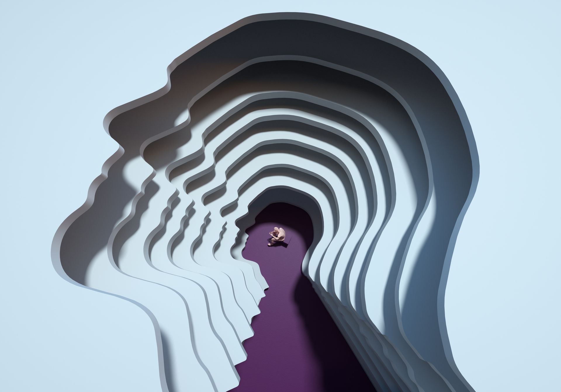 A person is walking through a tunnel in the shape of a head.