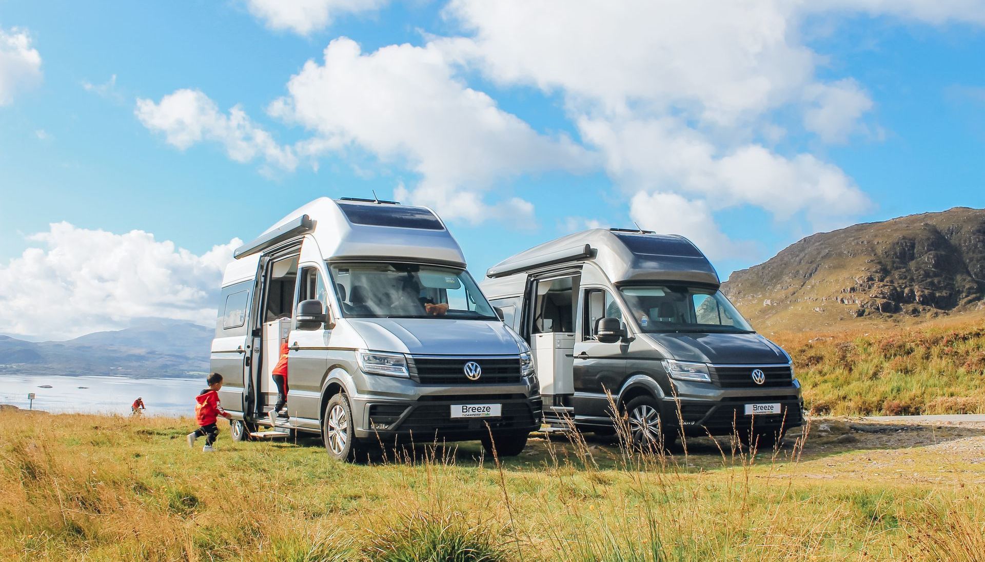 kids running into Grand California campervan