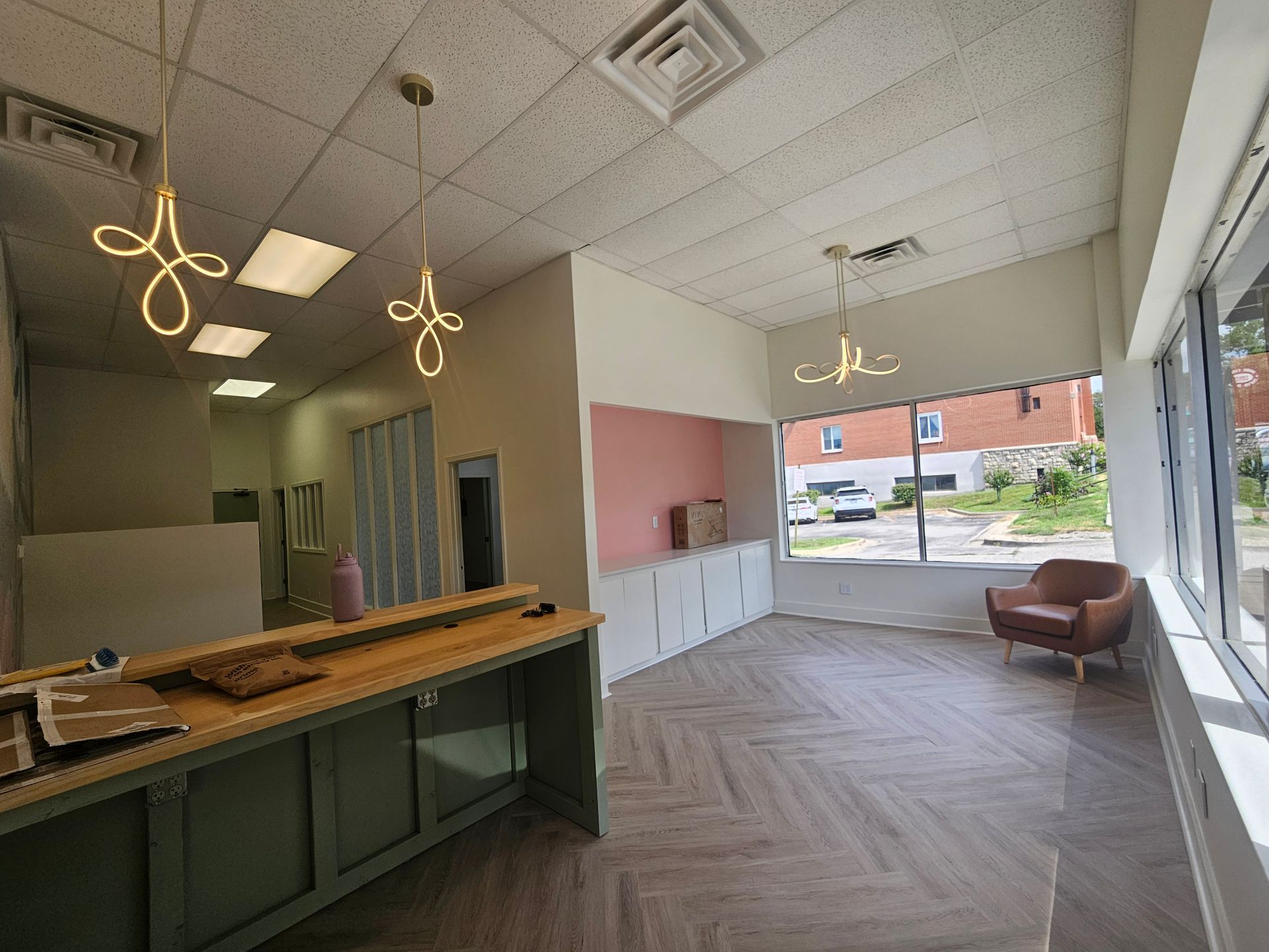 herringbone laminate flooring in a beautiful spa installed by under pressure 