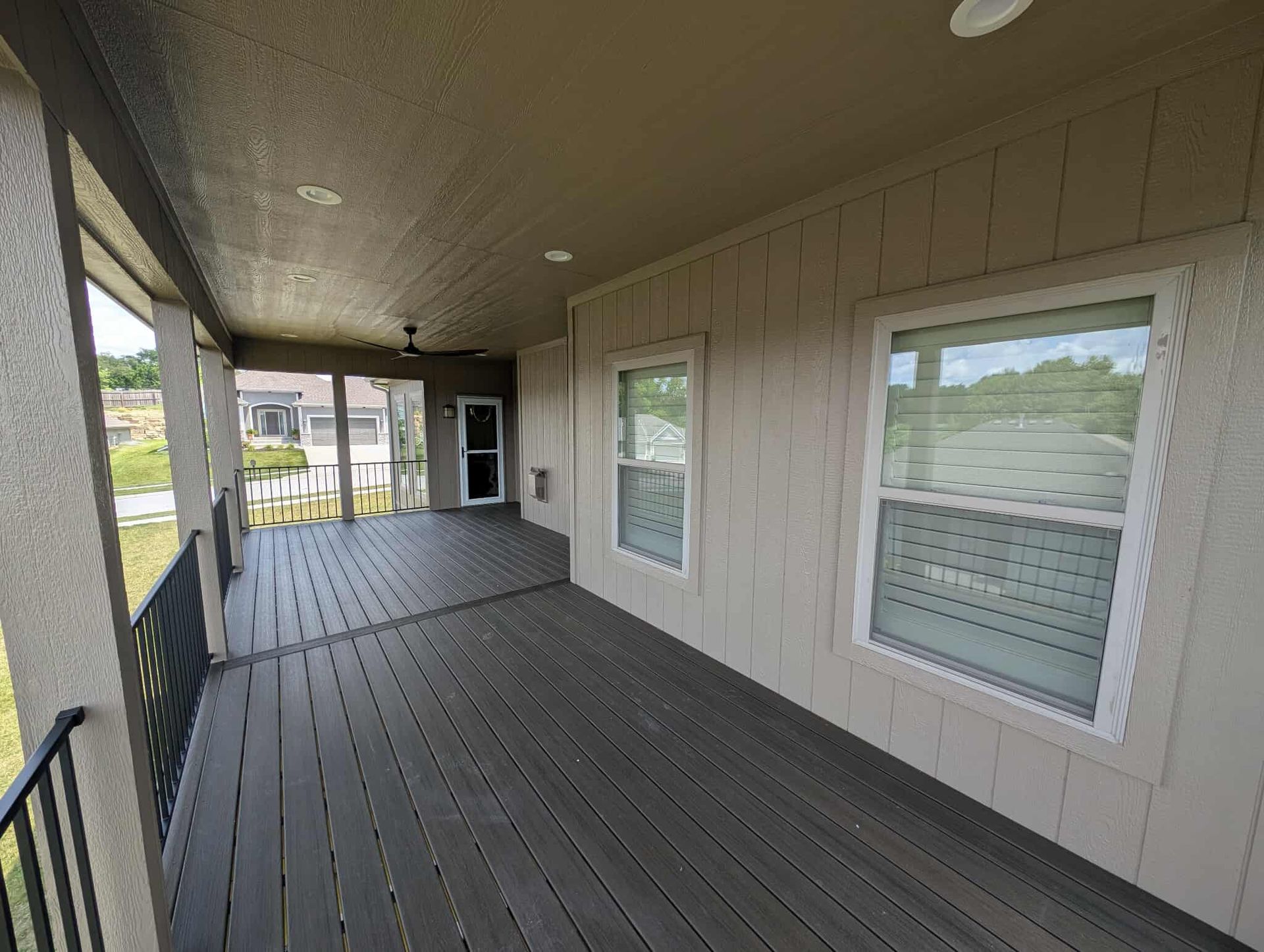 Custom built back deck with composite floor in Parkville Missouri