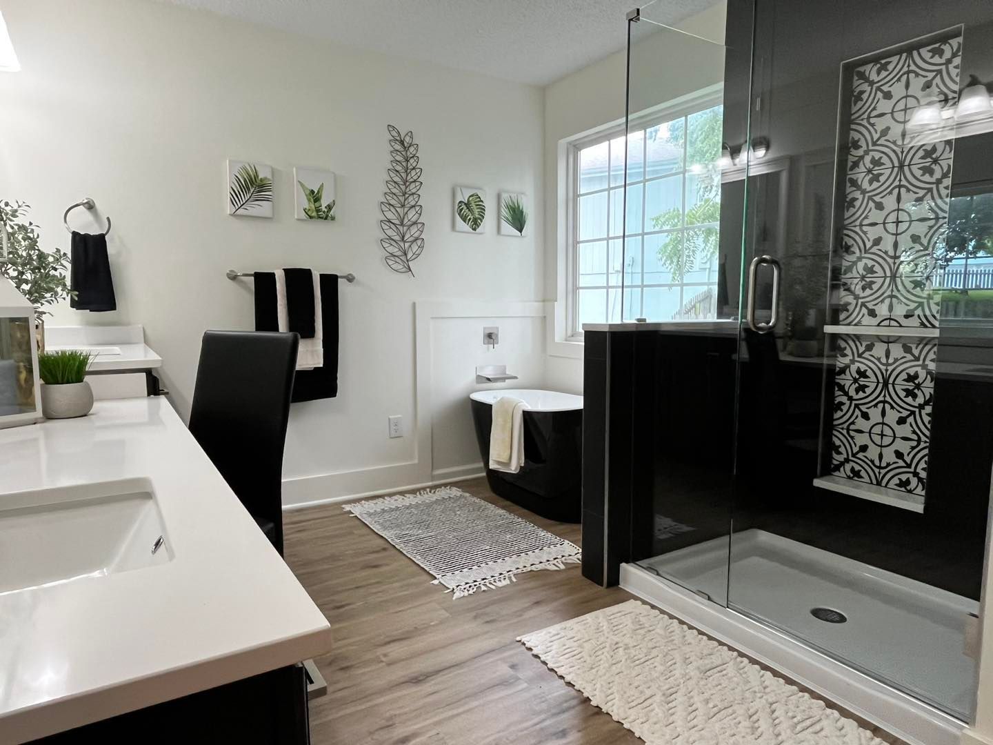 Vertical tile layout in a modern Prairie Village shower.