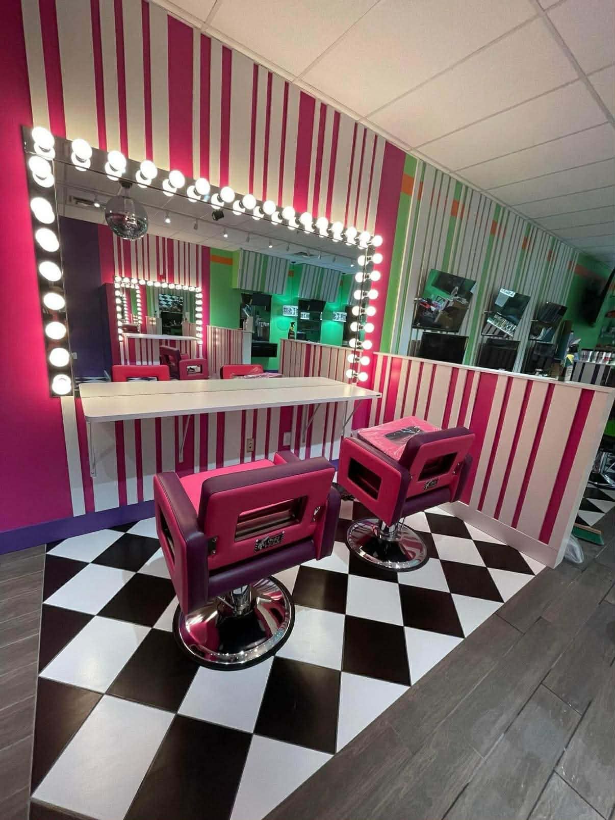 custom themed styling stations, colorful cabinetry, and kid-friendly salon seating