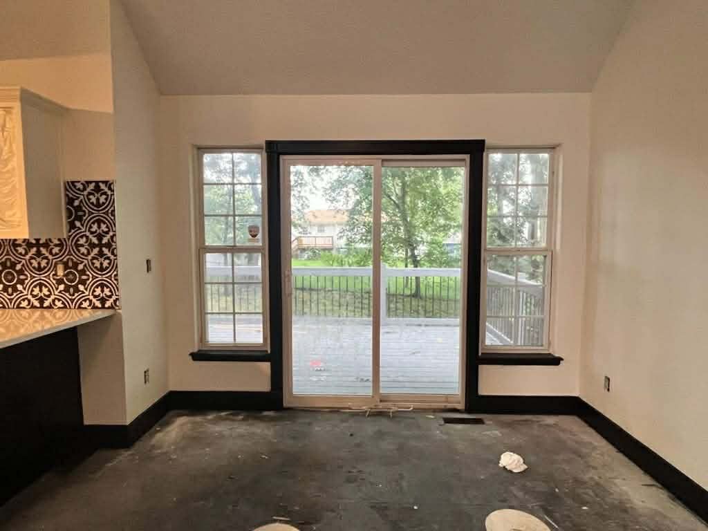 Black trim and white walls with adjacent matching tile Blue Springs Missouri