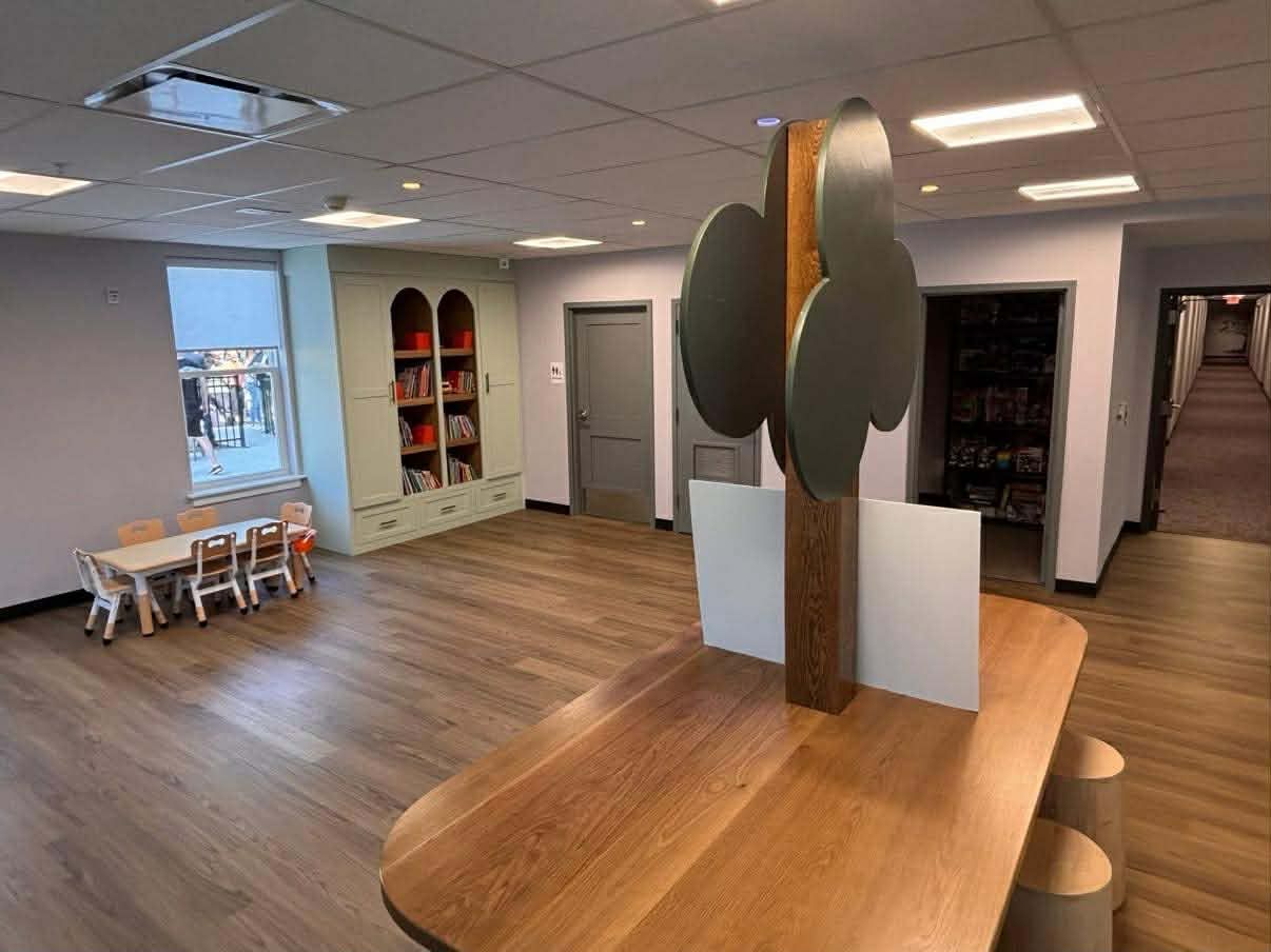 Custom cabinet and table in kids play room in Kansas City