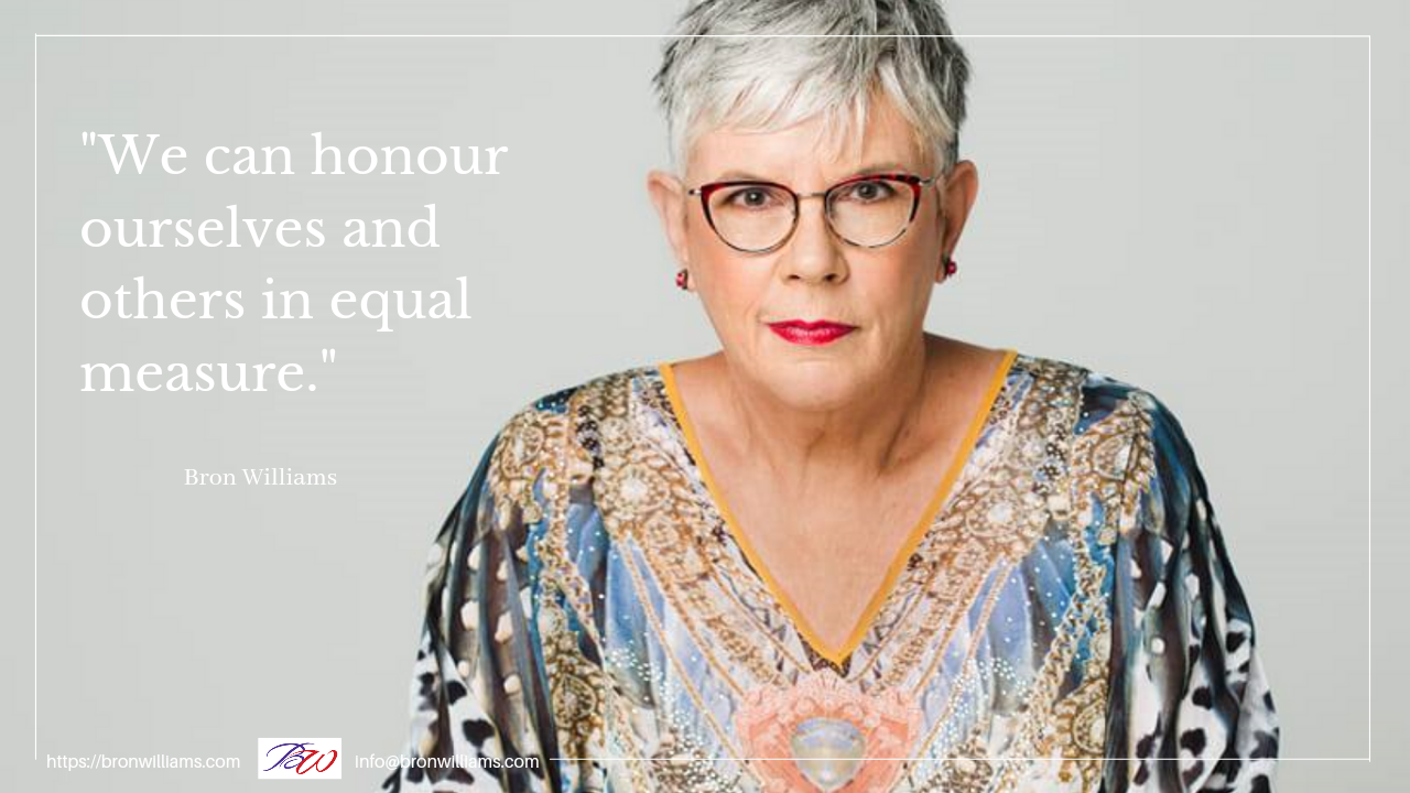 Woman with glasses and colorful shirt, text: 