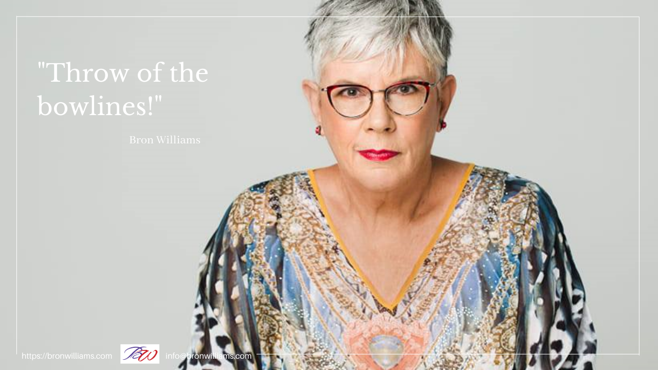 Woman with glasses, ornate top, quote 
