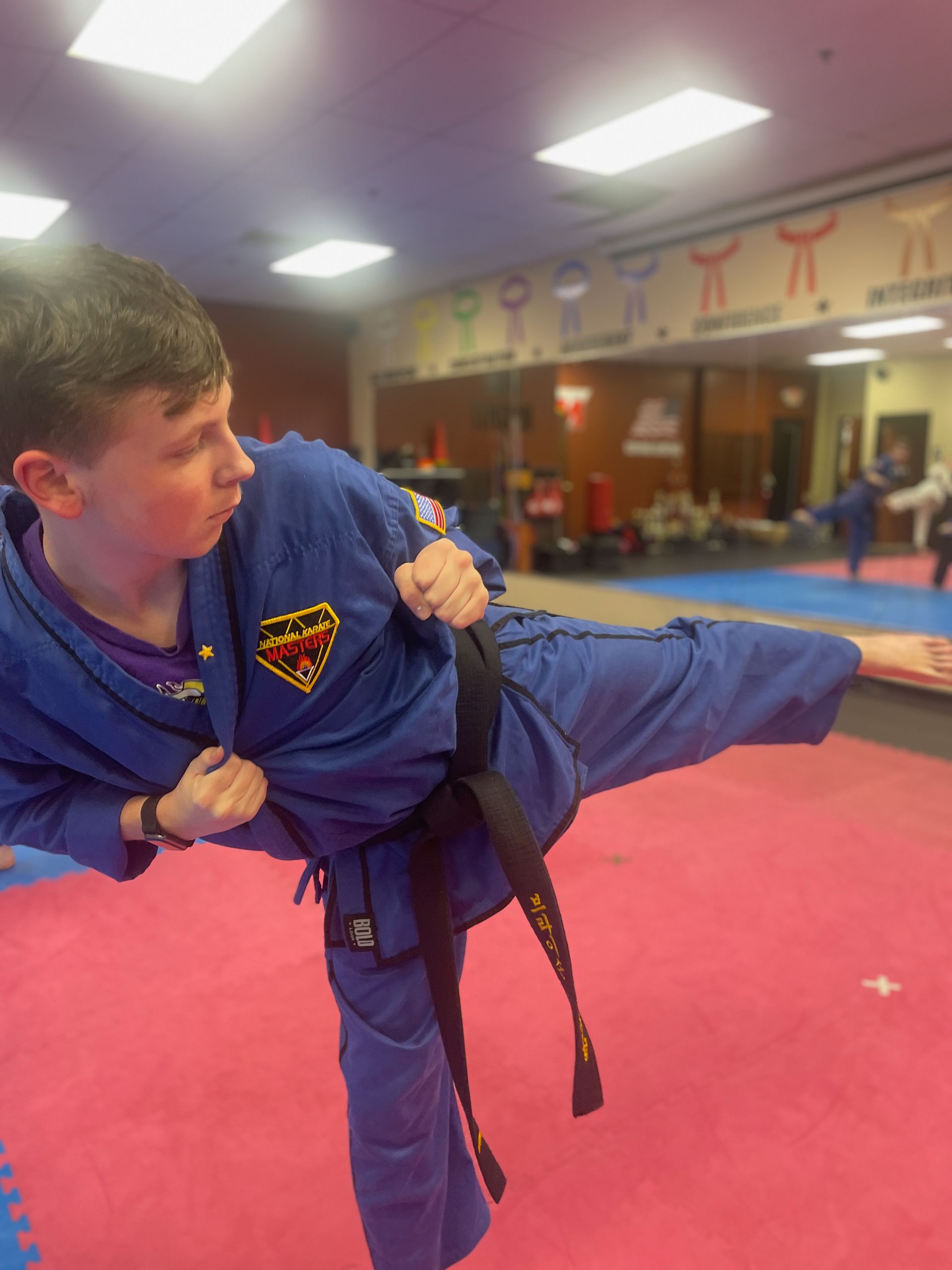 Students practicing belt-level Karate drills at Wisconsin National Karate in New Berlin, WI to build confidence.