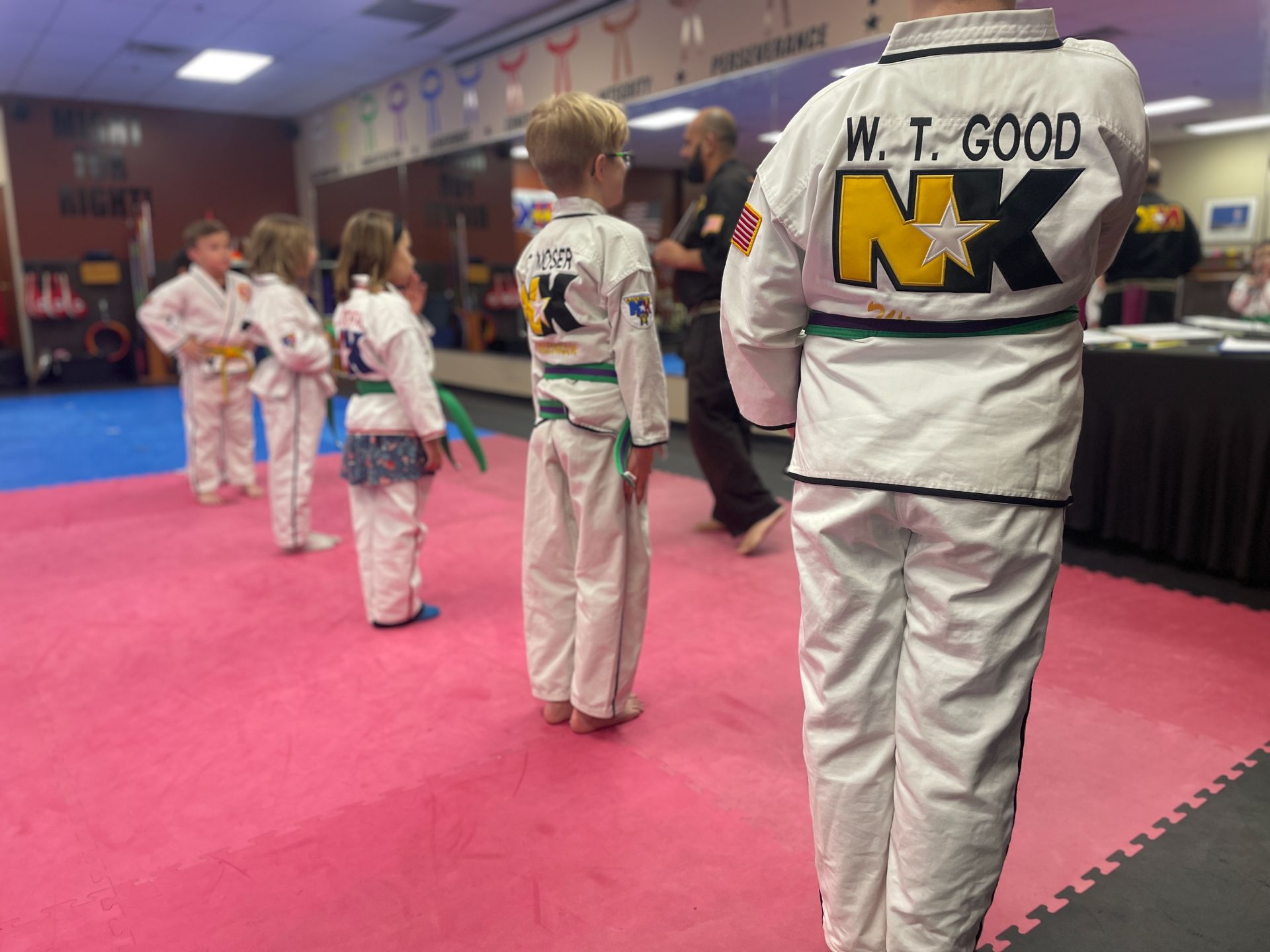 Kids practicing Karate drills at Wisconsin National Karate in New Berlin, WI, building focus, fitness, and resilience