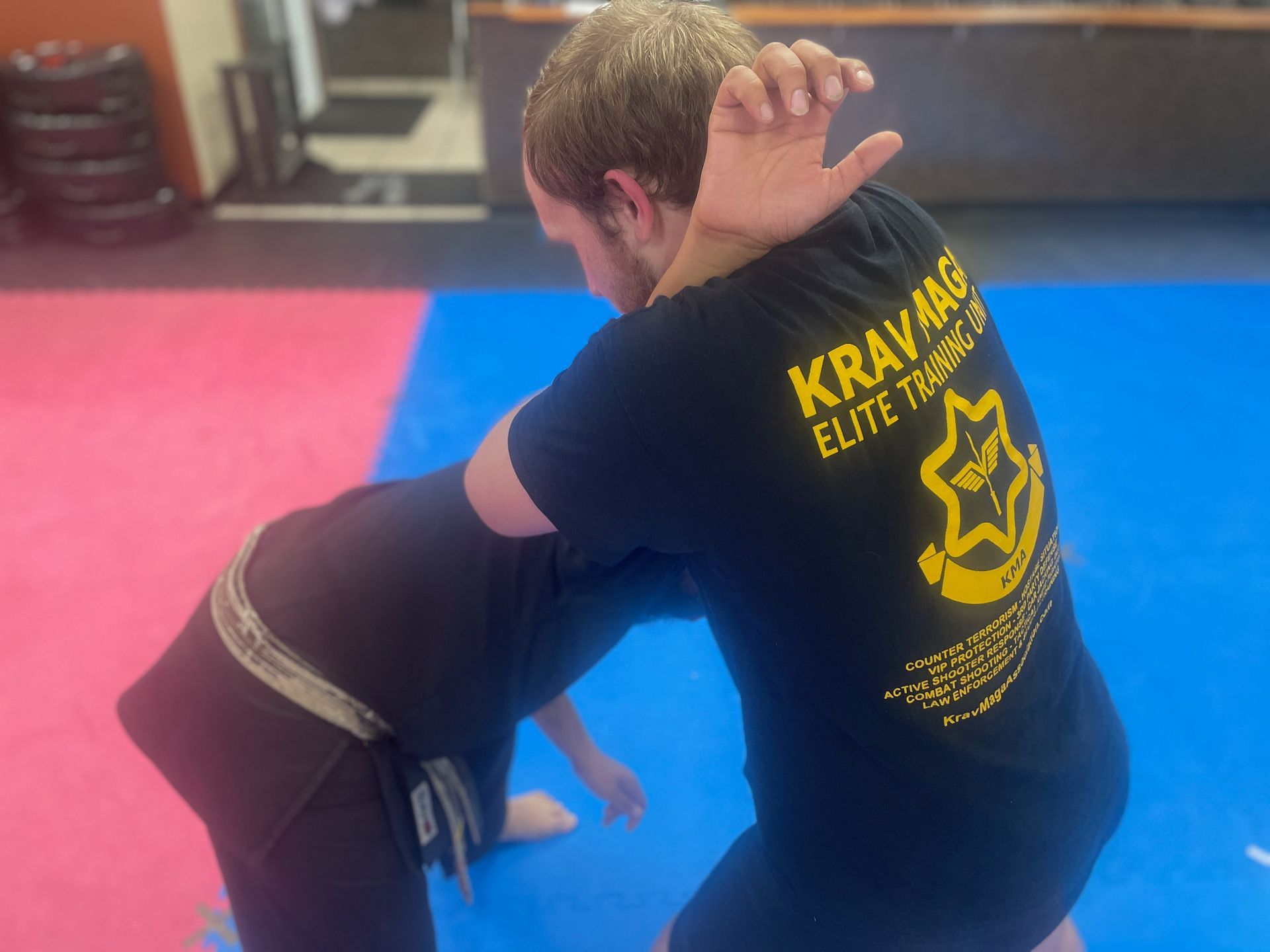 Adults training kickboxing combinations at Wisconsin National Karate Kickboxing & Krav Maga.