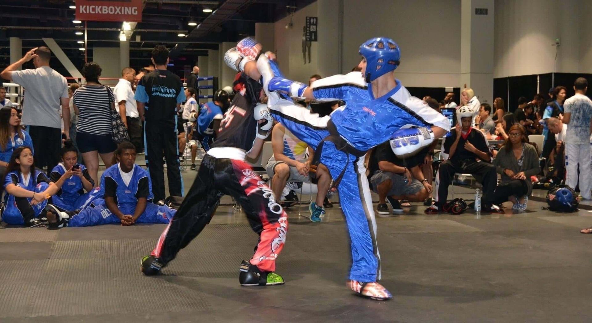 Kids practice kicks and balance drills at Wisconsin National Karate Kickboxing & Krav Maga in New Berlin, WI for coordination.