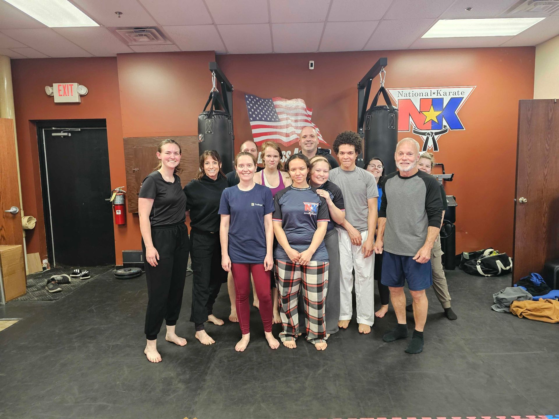 Women practicing Karate self-defense drills at Wisconsin National Karate Kickboxing & Krav Maga in New Berlin, WI for confidence.