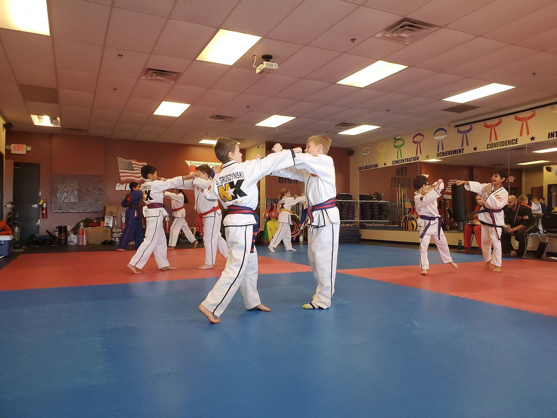 Kids practicing Youth Karate drills at Wisconsin National Karate in New Berlin, WI, building focus and confidence.
