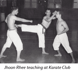 Instructor leading a dynamic Karate, Kickboxing, and Krav Maga class at Wisconsin National Karate Kickboxing & Krav Maga.