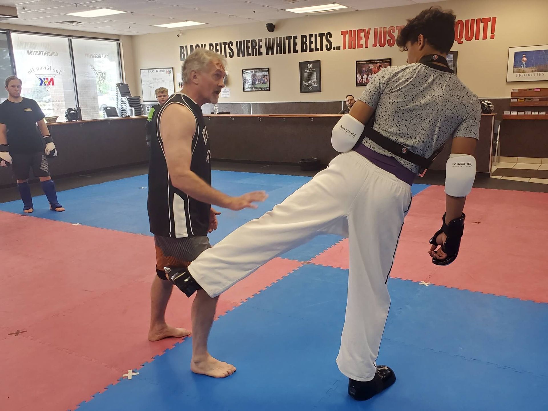 Adult Karate students practicing focused drills at Wisconsin National Karate Kickboxing & Krav Maga in New Berlin, WI for workday clarity.