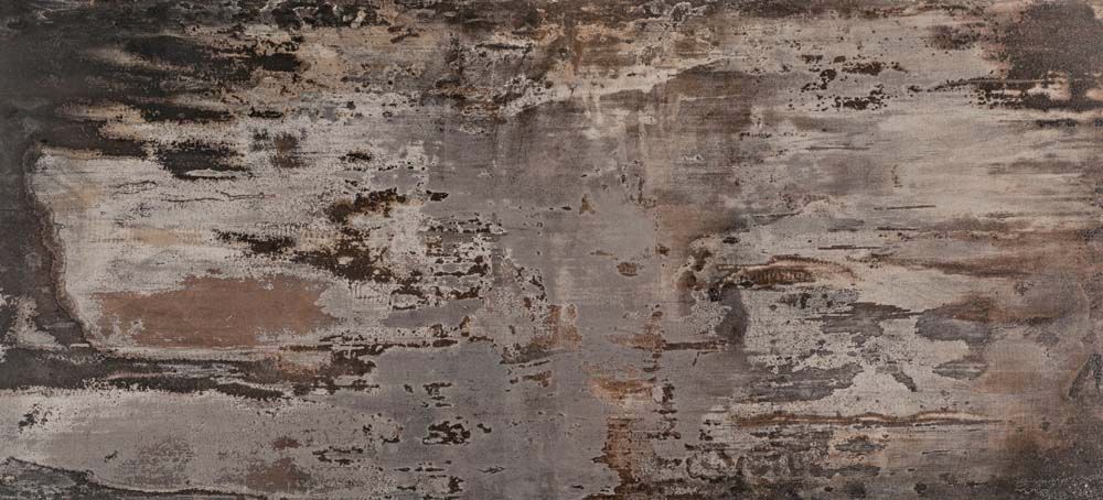 A close up of a concrete wall with a gray and brown texture.