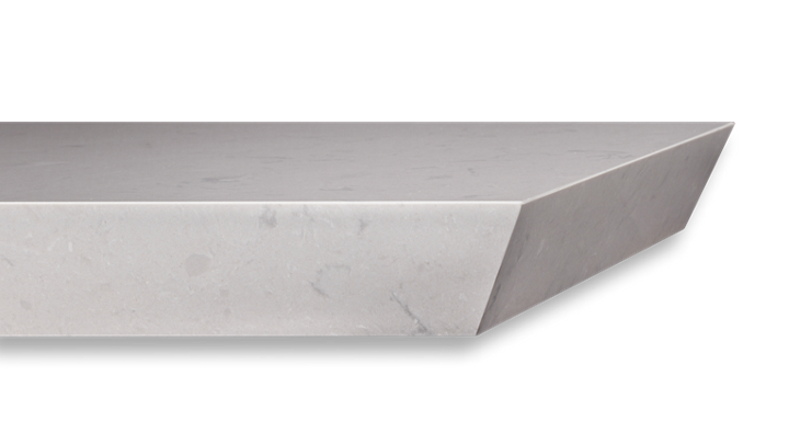 A close up of a white marble counter top on a white background.