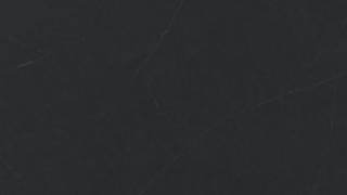 A close up of a black chalkboard texture.