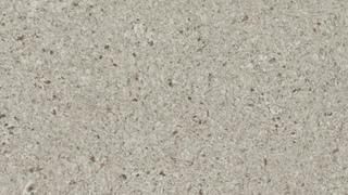 A close up of a gray granite counter top.