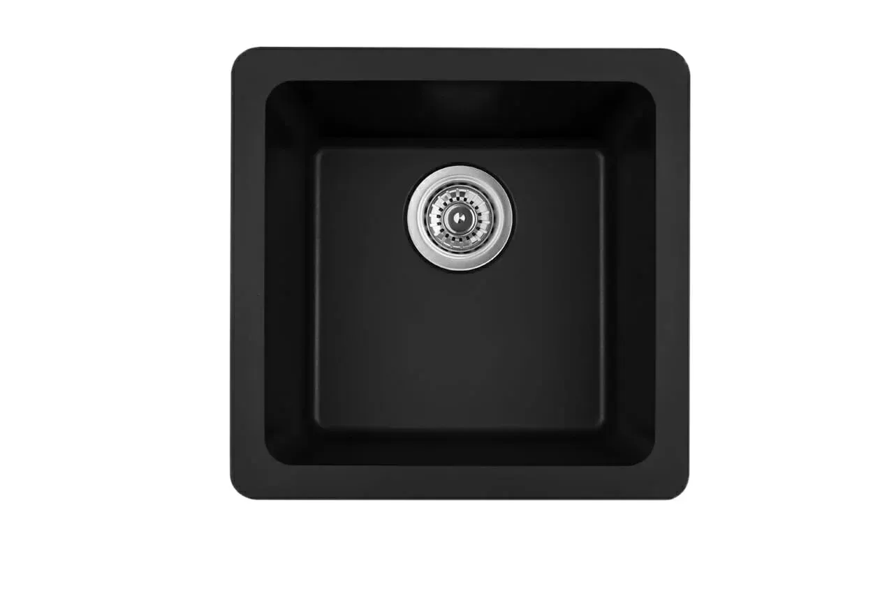 A black kitchen sink with a drain on a white background.