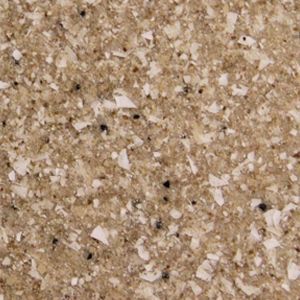 A close up of a brown and white granite counter top.