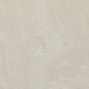 A close up of a white tile with a grainy texture.