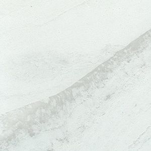 A close up of a white wall with a gray stripe on it.