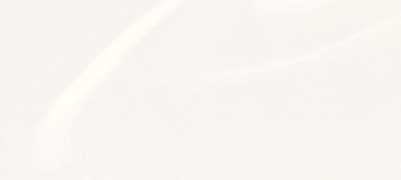 A close up of a white surface with a shadow on it.