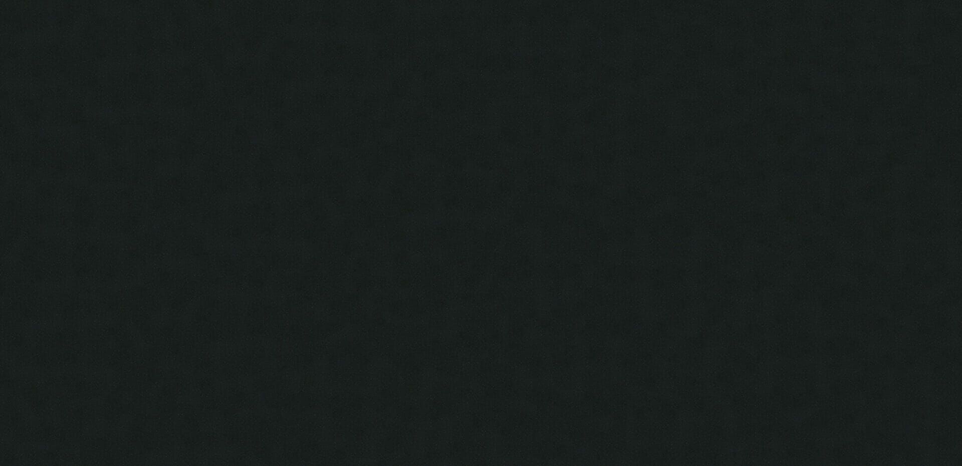A close up of a black fabric texture.