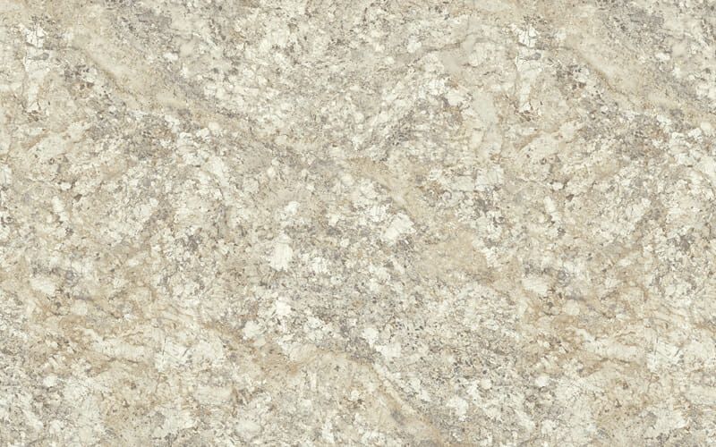 A close up of a beige granite counter top.