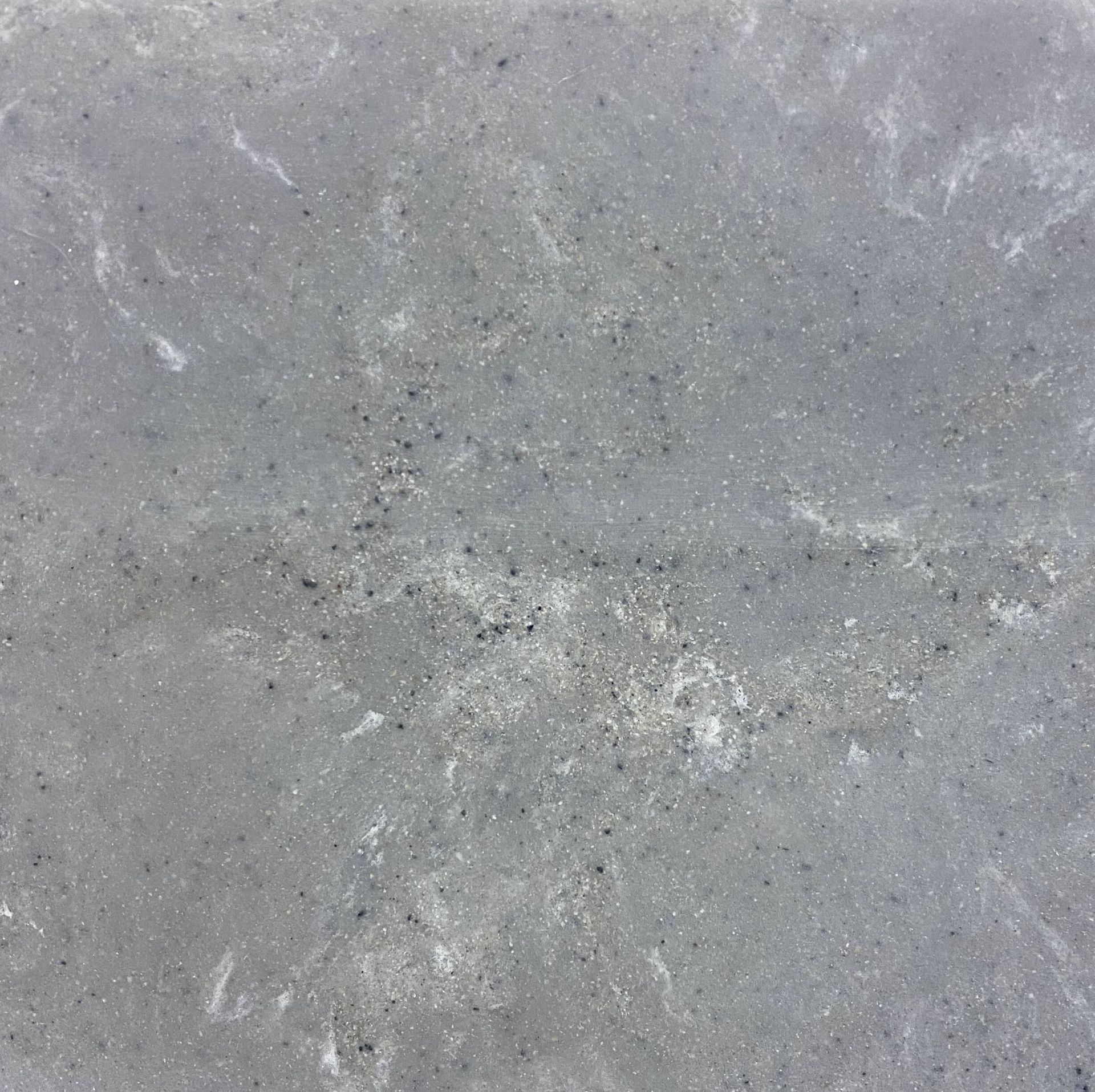 A close up of a gray concrete surface