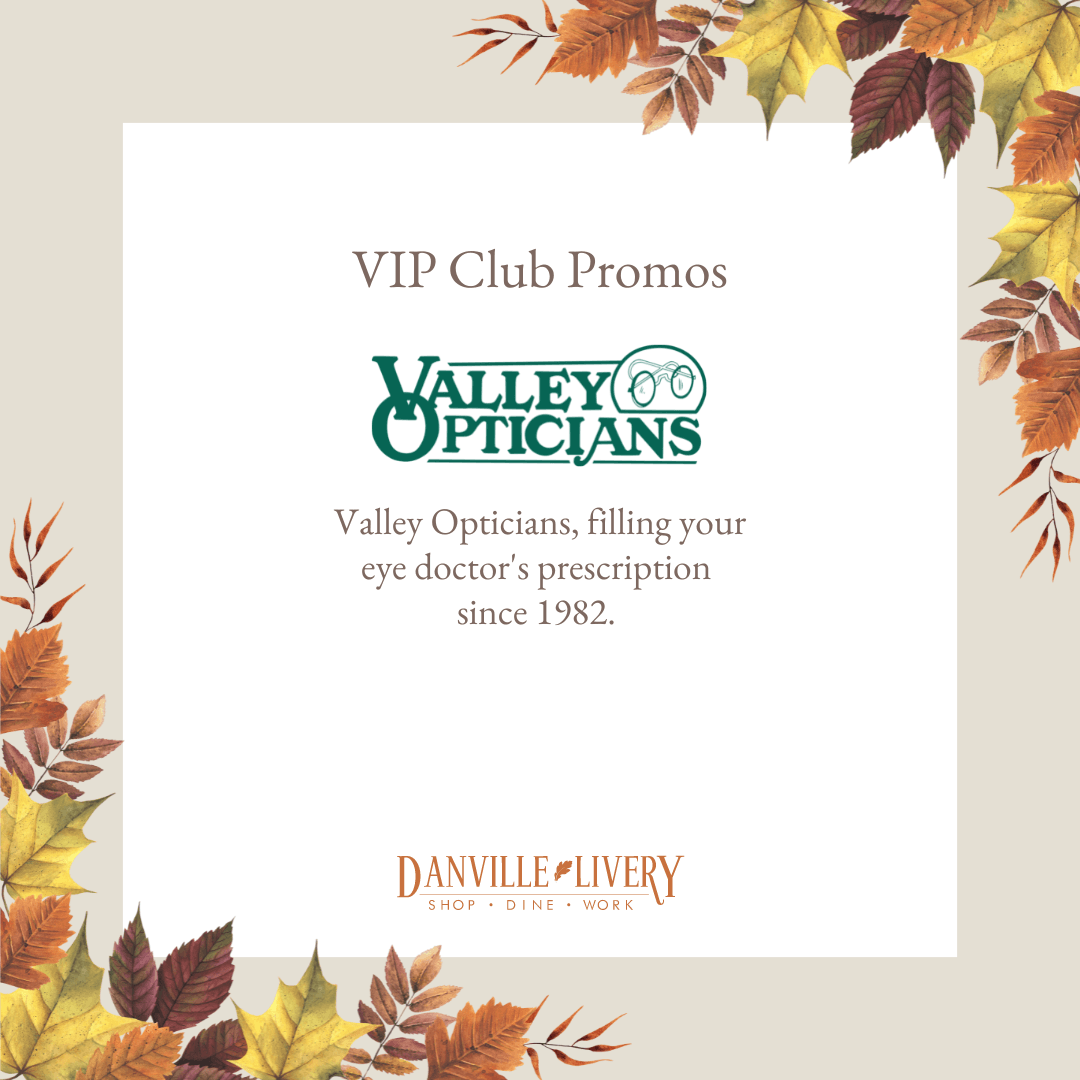 An advertisement for valley opticians with autumn leaves around it