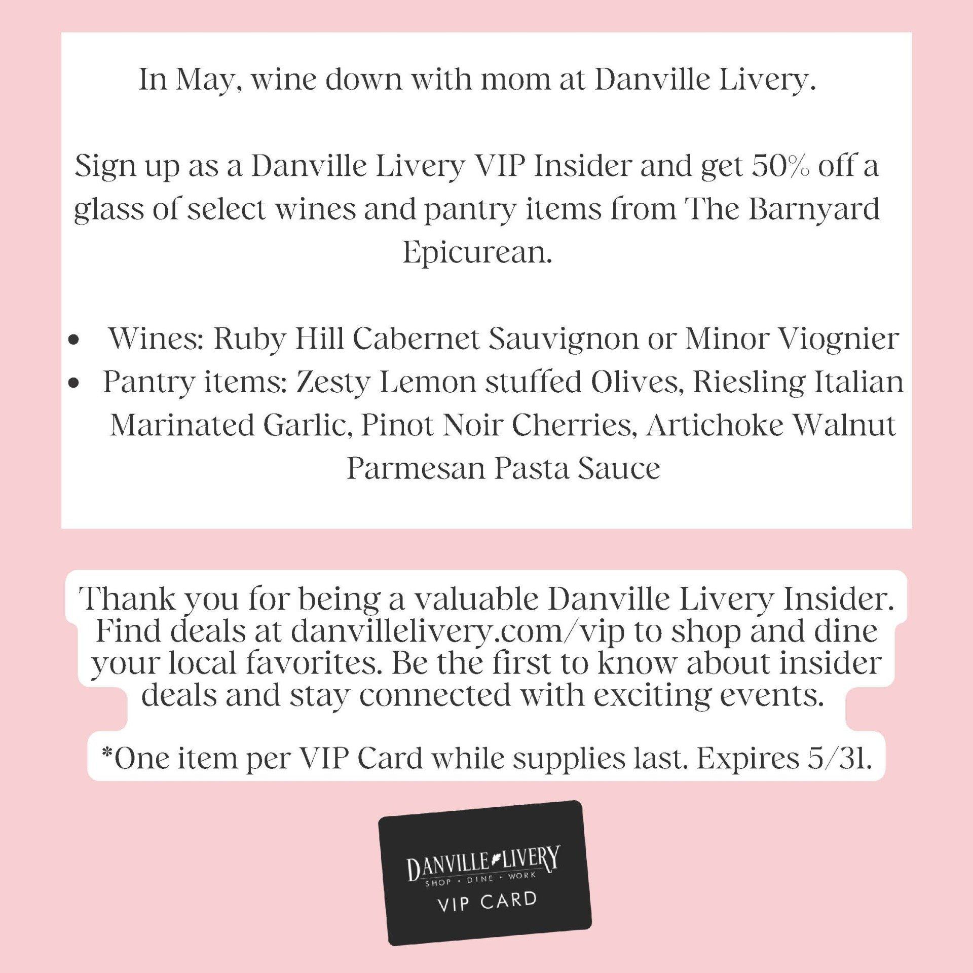 A pink sign that says in may wine down with mom at danville livery