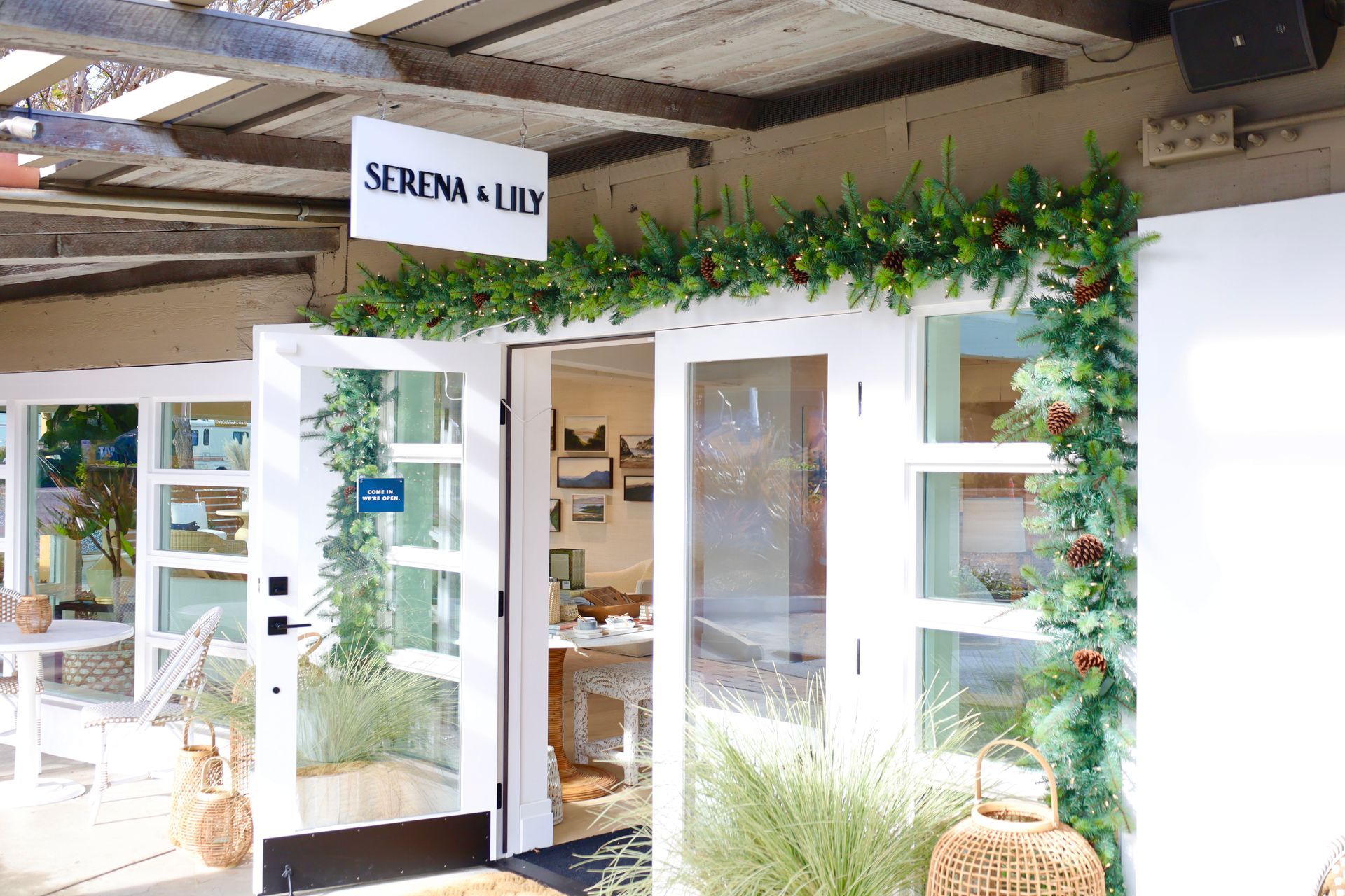 A store front with a sign that says serena & lily