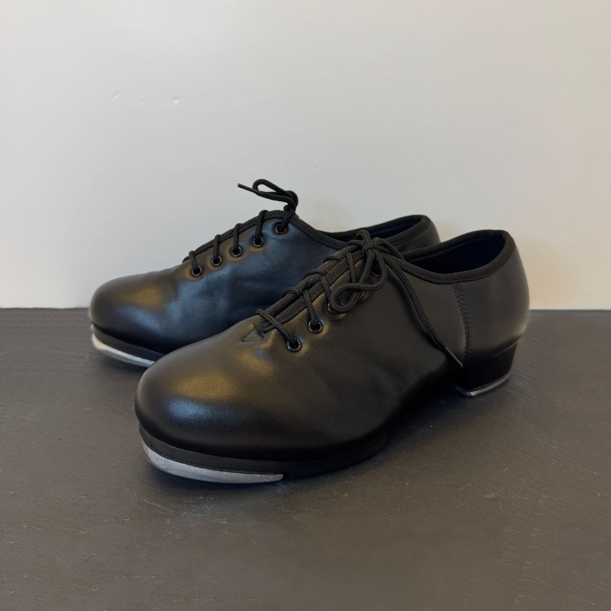 CHAUSSURES DE CLAQUETTES FLEX