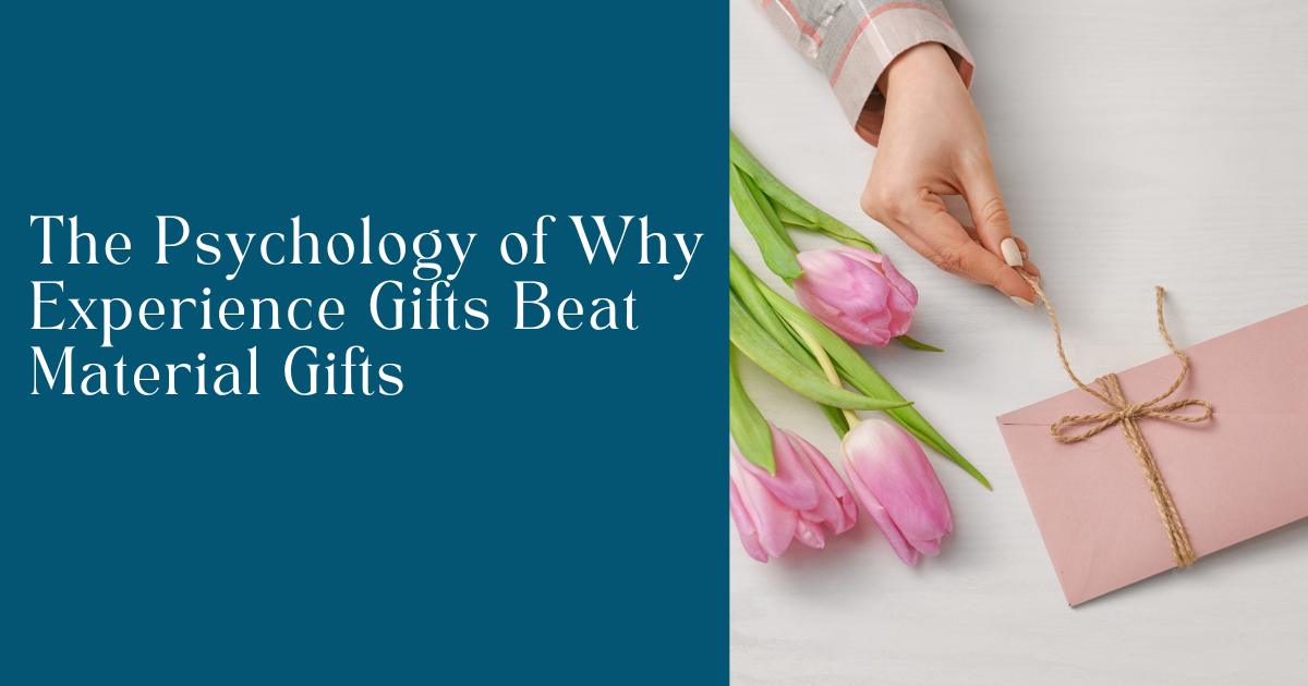 Hand untying twine on a pink gift envelope beside fresh pink tulips