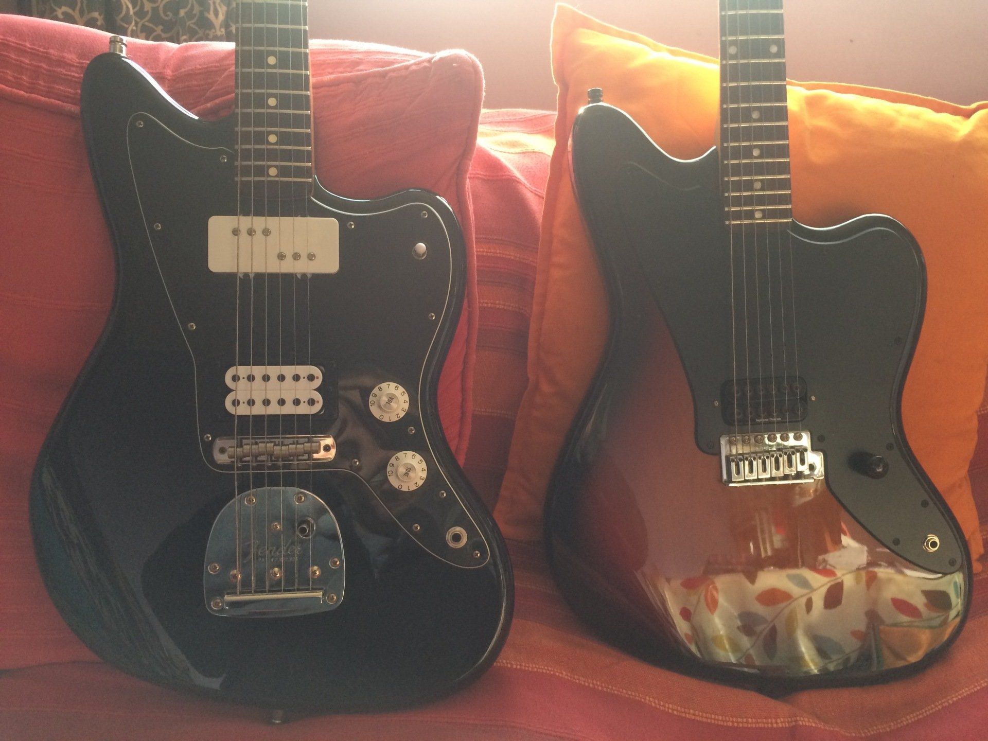 A pair of Metalmasters with some heavy iron bridge pups Jazzmasters with replaced pickups