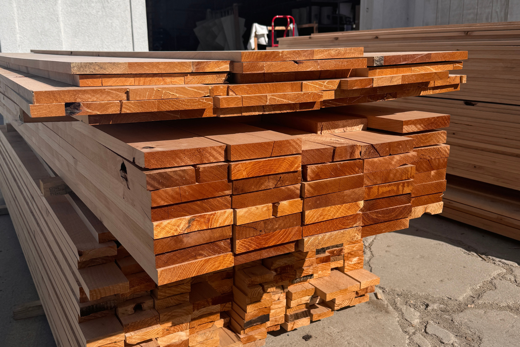 A pile of wood is stacked on top of each other