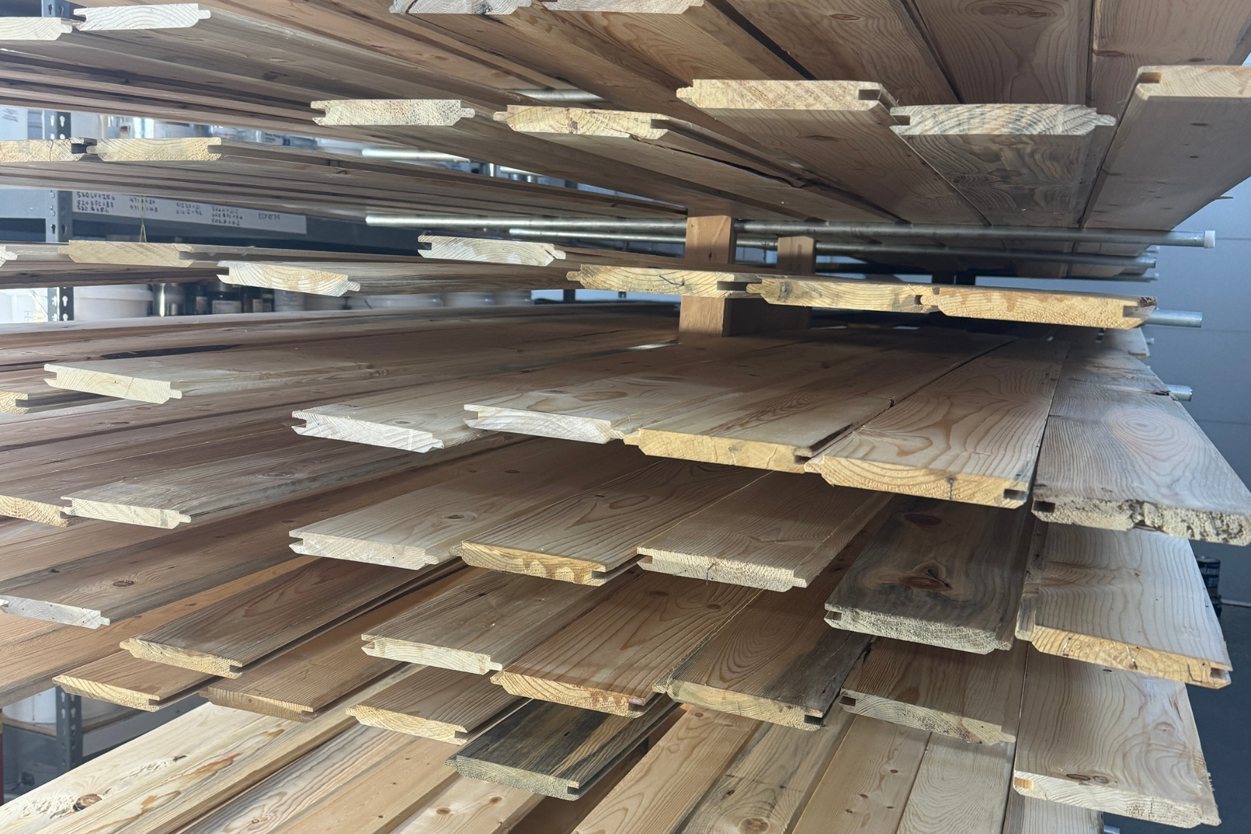 A pile of wooden planks stacked on top of each other.