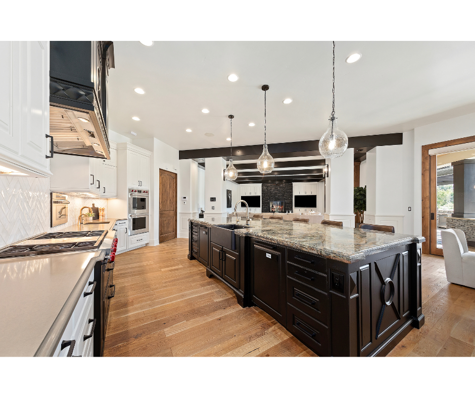 There is a large island in the middle of the kitchen.