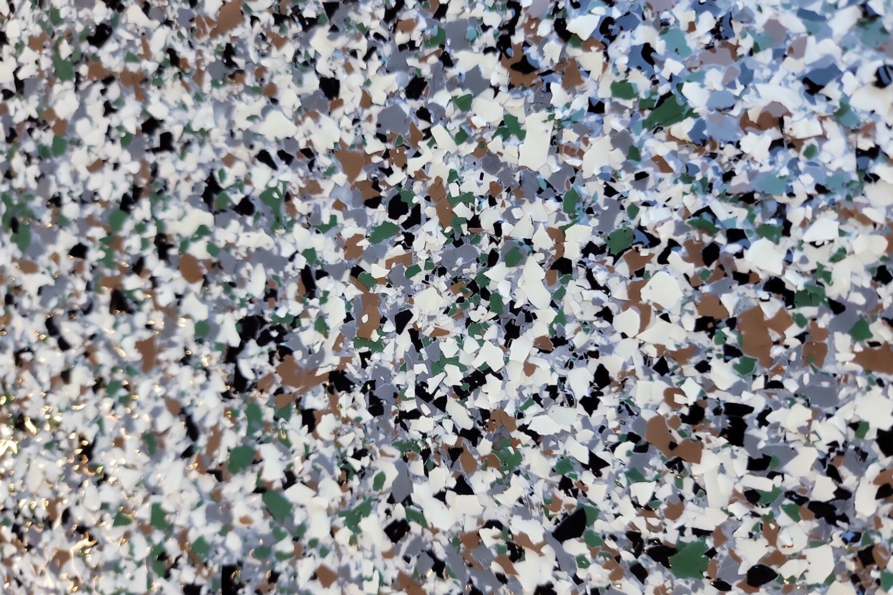 A close up of a camouflage pattern on a surface.