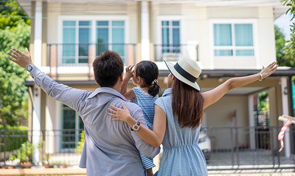 Family In Front Of Their House — Summerville, SC — Corvino Insurance Agency, Inc.