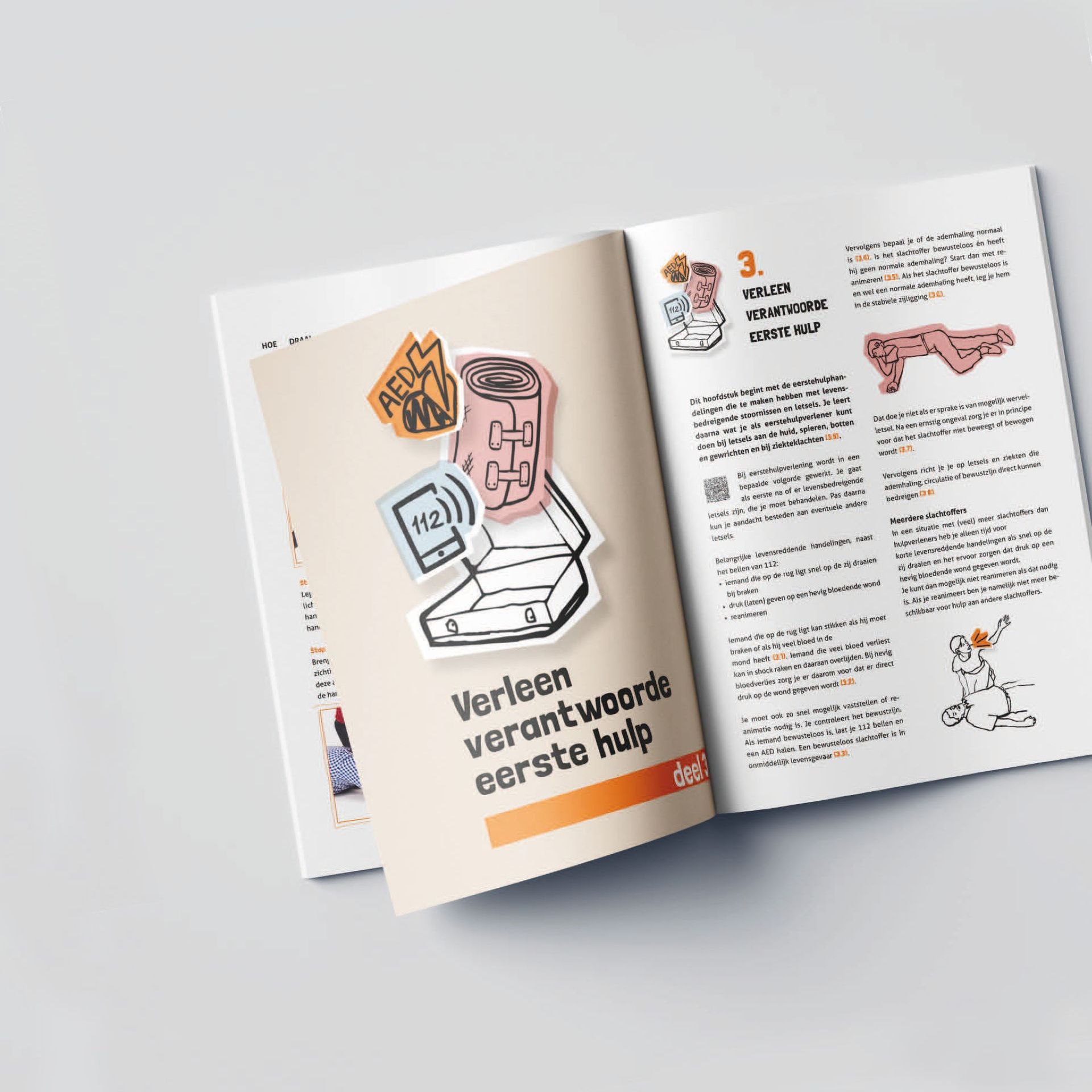 Een boek is opengeslagen op een pagina waarop staat eerste hulp