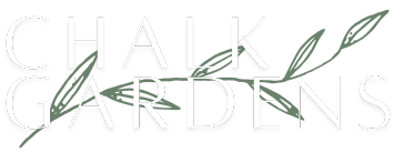 Light gray “CHALK GARDENS” text with green leafy branch illustration across the words